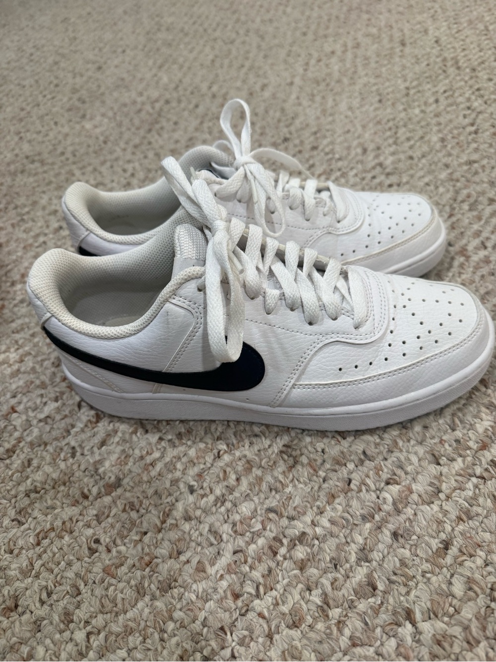 Nike White Low-Top Sneakers with Black Swoosh Accent